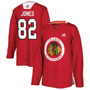 Men's Chicago Blackhawks Caleb Jones Adidas Authentic Home Practice Jersey - Red